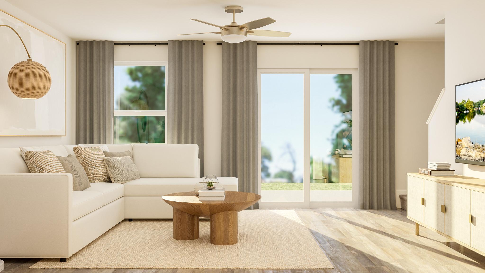 A living room with a large window.